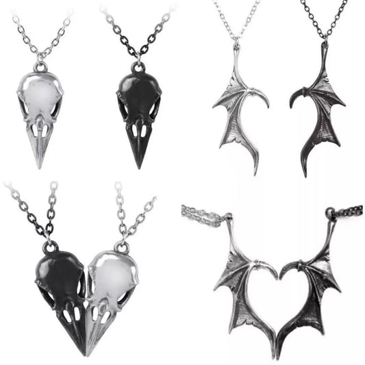 different gothic couple necklaces, one white one black